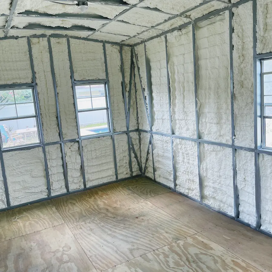 Closed-cell spray foam insulation applied to wall cavities in a residential project in Seminole